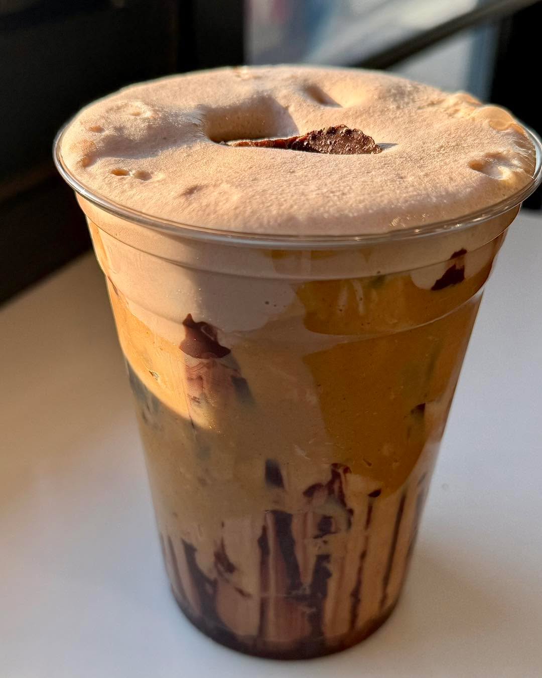 “Peanut Butter Mocha Mud” Latte: Mocha and Peanut Butter, Mocha Cold Foam, Mini Reese’s Peanut Butter Cups 🥜🍫📍 Pearl's Bagels & Bakery, 16 Picotte Drive, Albany, New York